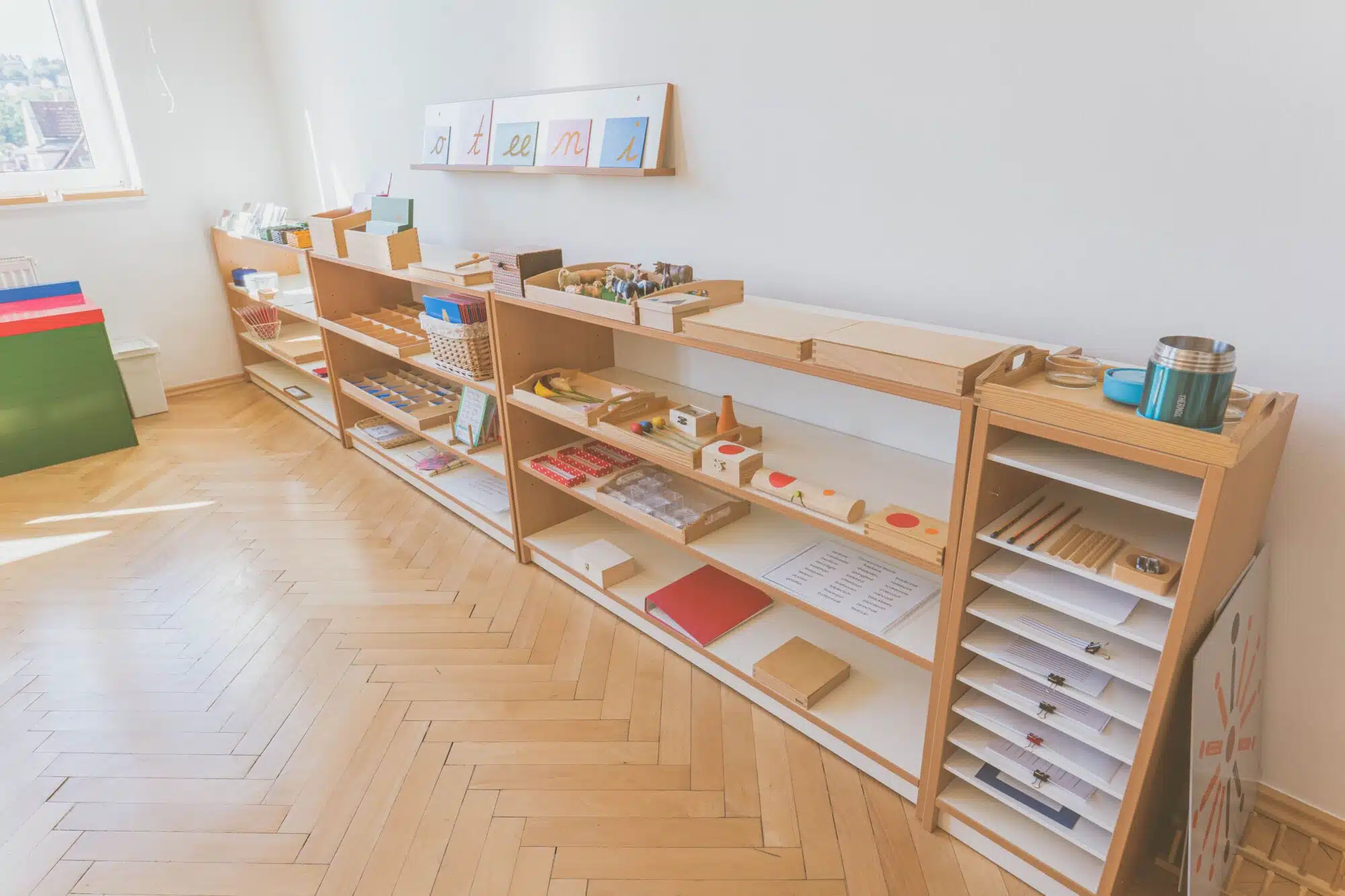 Child engaged in focused, hands-on Montessori work